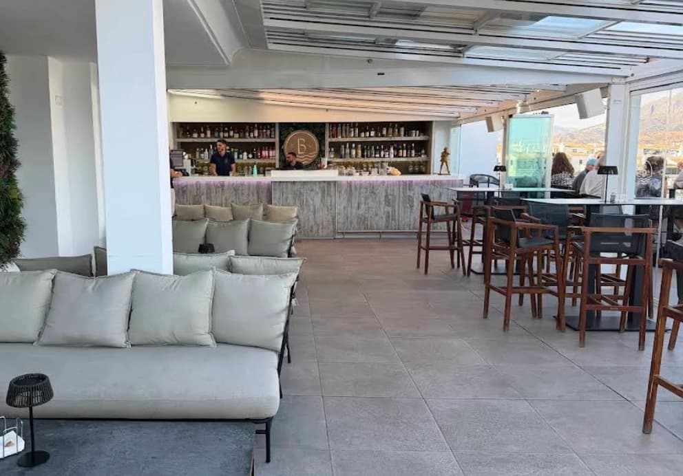 Sofa seating and high stools at the bar at Sky Lounge, Benalmadena