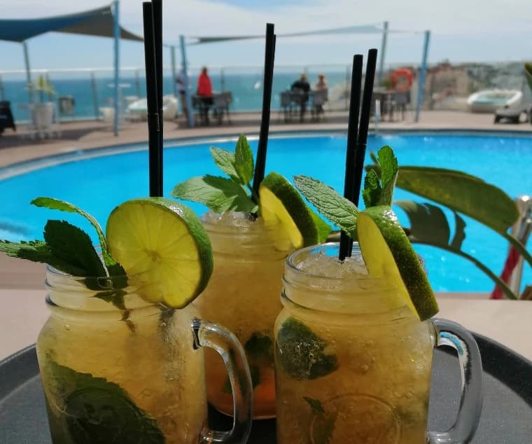 Two mojitos in jars beside the pool at Sky Bar, Hotel El Puerto Fuengirola