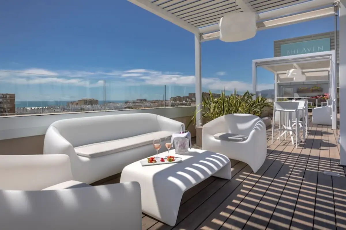 White sofa lounge with sea views on the B-Heaven rooftop terrace Malaga