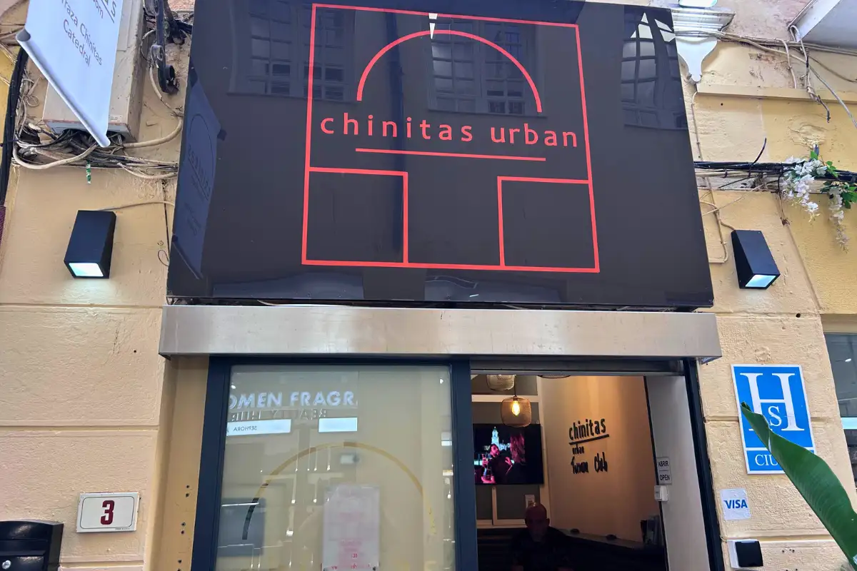 Chinitas Urban sign above the street entrance in Malaga old town