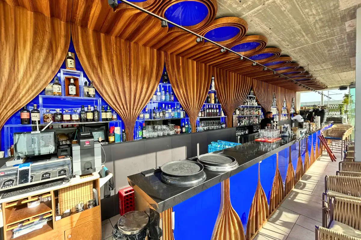 Striking blue stained-glass bar counter at Cobalto 15 in Malaga