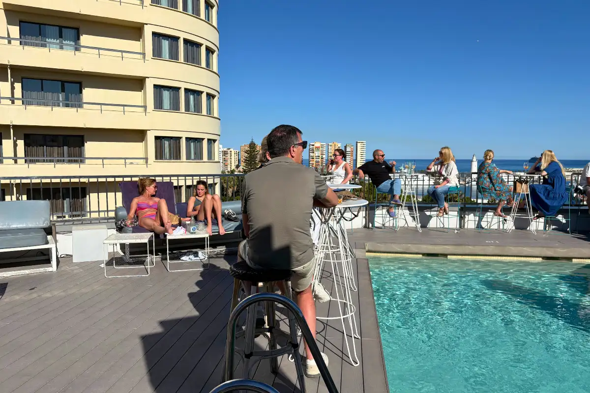 Man on a bike sculpture beside the rooftop pool at Hotel Molina Lario in Malaga