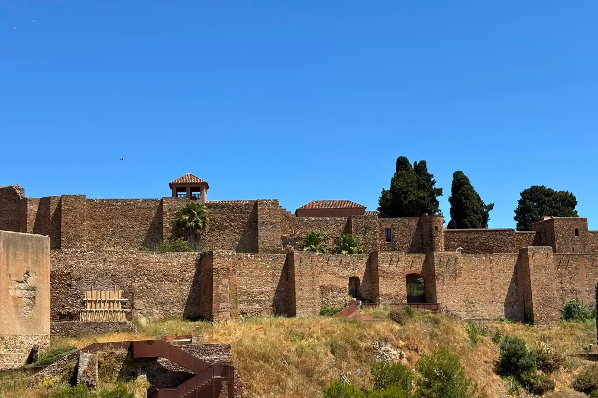 Stone ramparts of the Alcazaba fortress seen from La Terraza de Alcazaba in Malaga