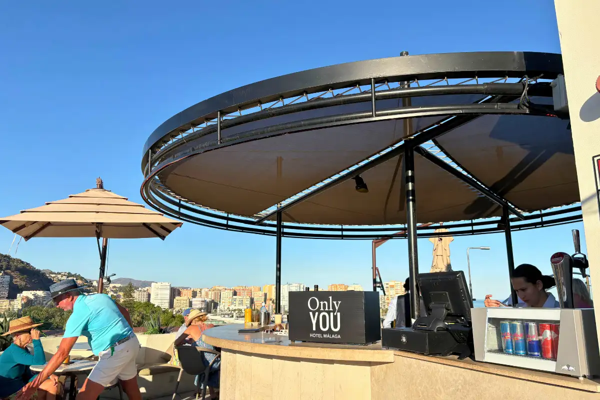 Large circular canopied bar on the rooftop terrace at Lolita Skyview in Malaga