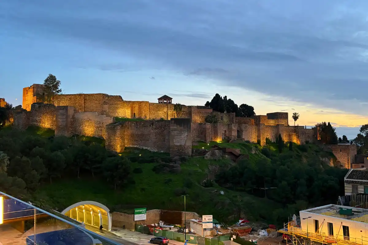 Floodlit Gibralfaro castle walls at dusk seen from Canitas Maite, ME Malaga