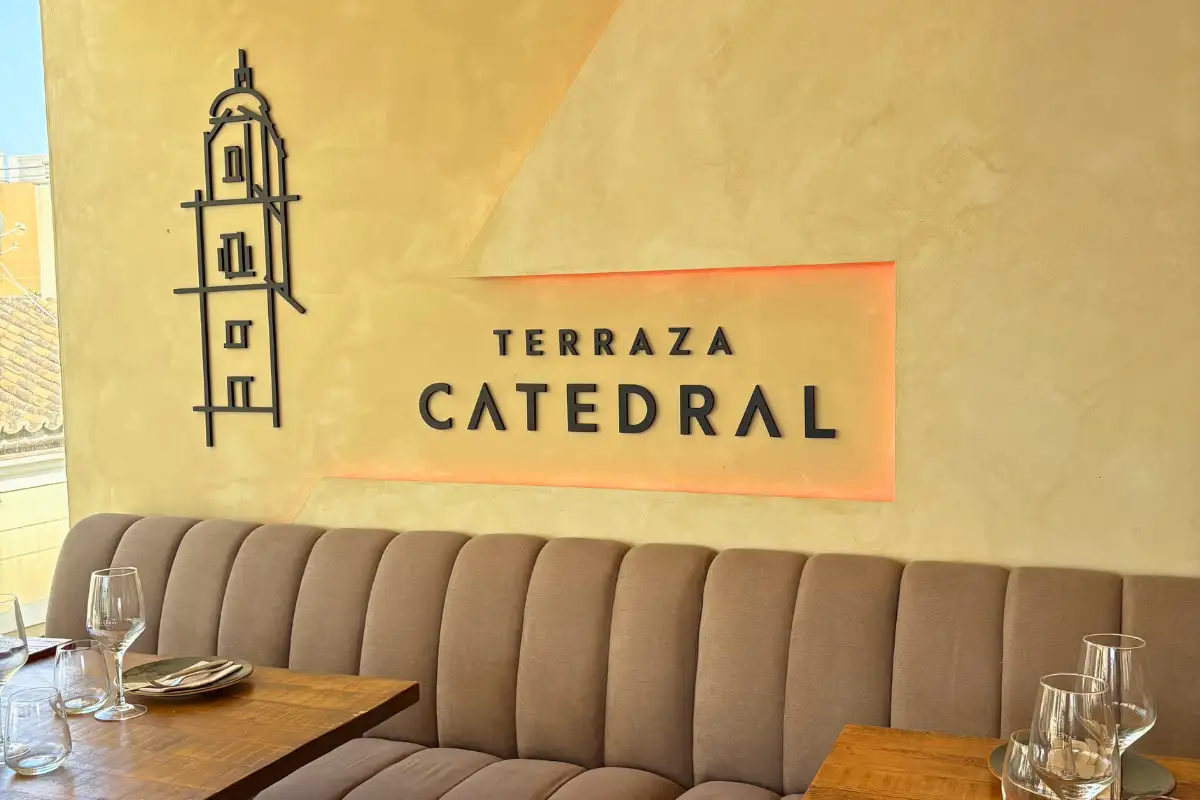 Terraza Catedral logo sign with cathedral tower on the interior wall in Malaga