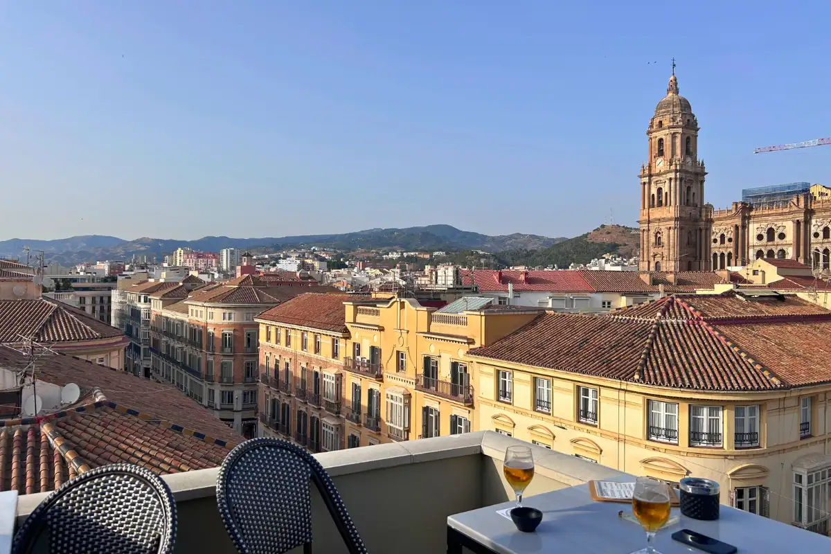 Rooftop terrace view over Malaga rooftops to the cathedral at Vincci Larios Diez