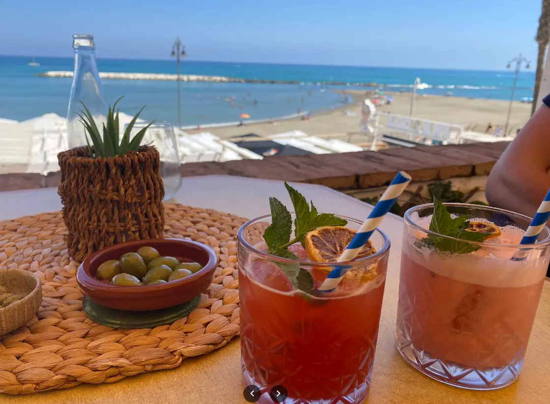 Seafront cocktails and olives at Almika Rooftop Benalmadena