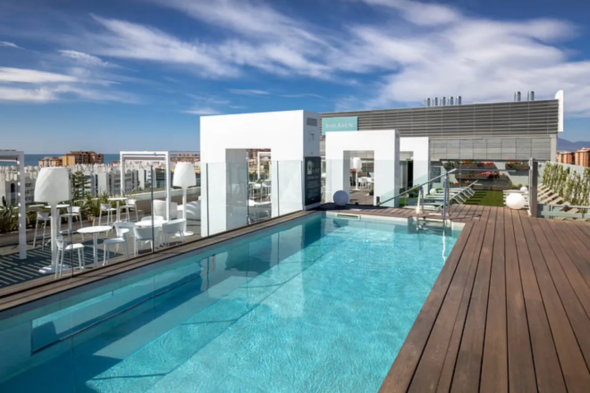 Rooftop infinity pool and loungers at B-Heaven, Barcelo Malaga
