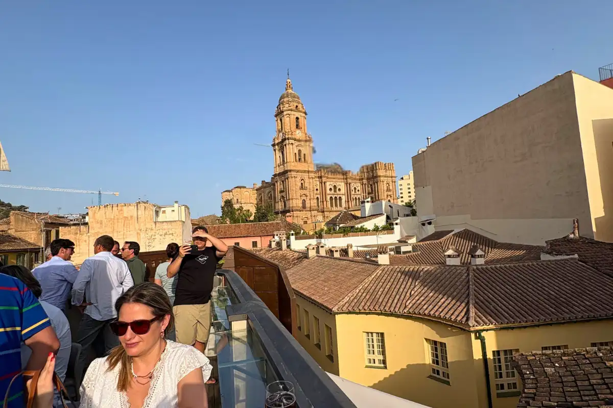 Sunset cathedral view over rooftops from Chinitas Urban in Malaga