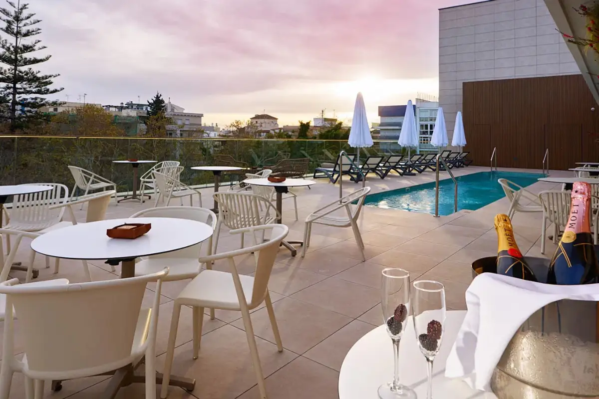 Pool terrace with tables at sunset at 360 Blue Sky Bar Marbella