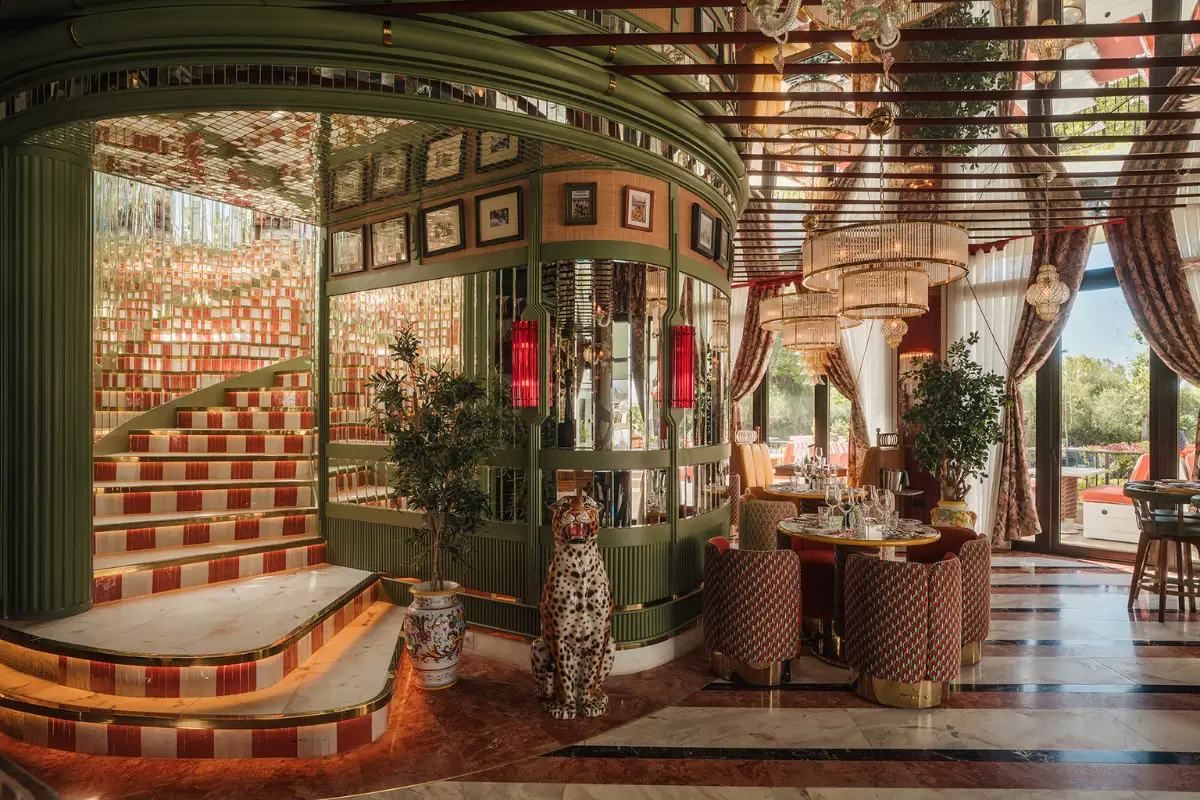 Eclectic green-tiled lounge interior at Cielo rooftop in Marbella