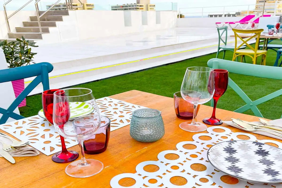 Set dining table with wine glasses on the terrace at Gastrobar Sireno Torremolinos
